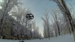 Snowboarding toddler uses flying drone to move around