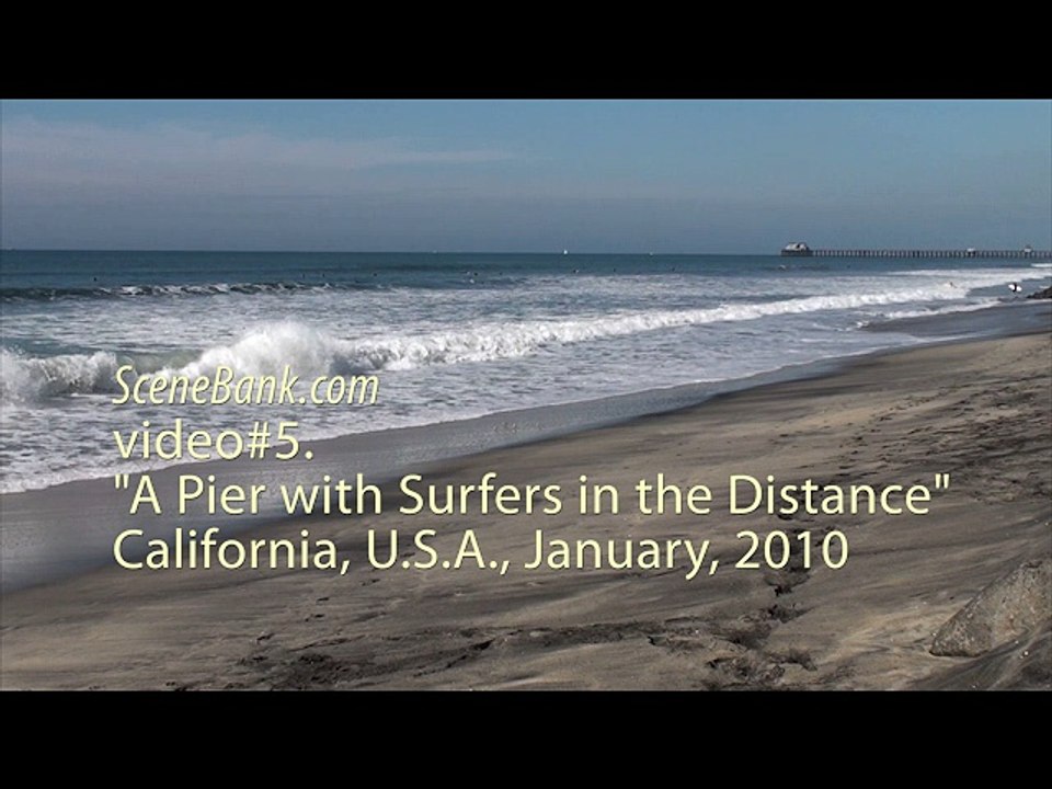 A Pier with Surfers in Distance