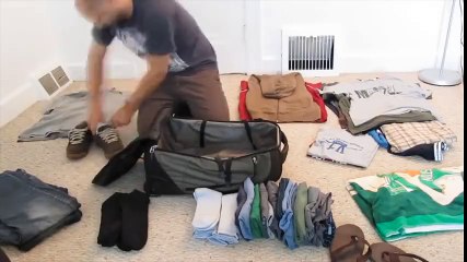 Packing    many clothes in a    little Bag