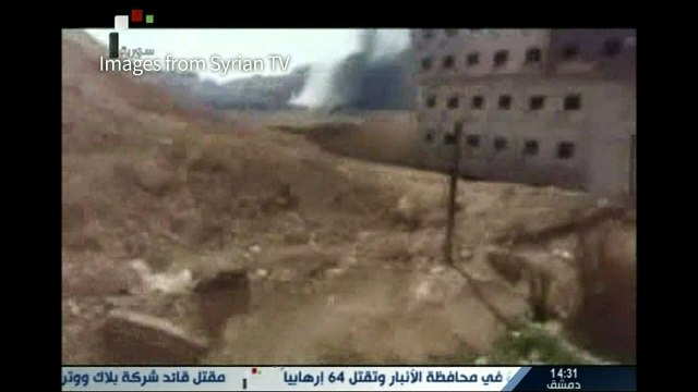 Dozens killed in IS-claimed bombings near Syria shrine