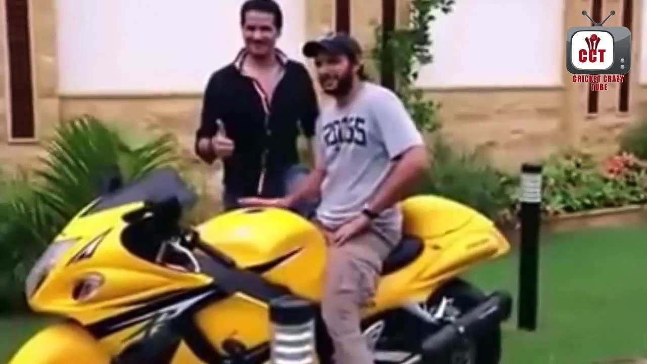 Afridi and Dhoni bike