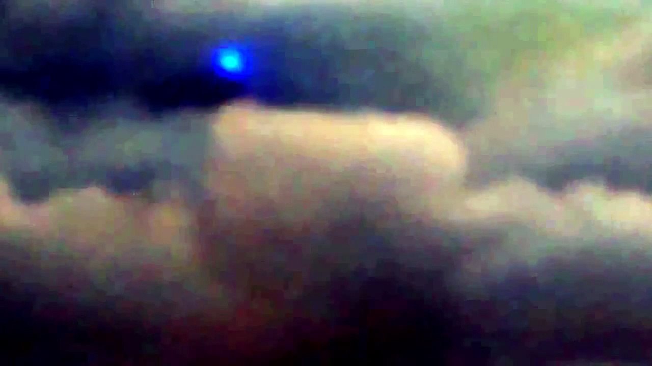 UFO FLYING BEHIND THE PLANE!