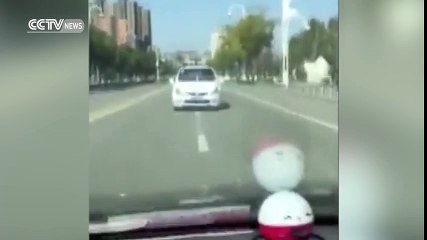 Footage- Man held in custody for driving backwards