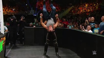 Seth Rollins powerbombs Dean Ambrose into the barricade- Slow Motion Replay from Money in the Bank