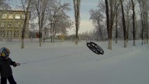 Kid rides his Snowboard with a Drone pulling him!