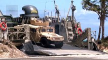 US Navy LCAC Hovercraft Land on Beach, Unload Equipment, Return to Aircraft Carrier