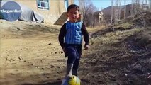 Afghan boy sports Lionel Messi football shirt made from plastic bag