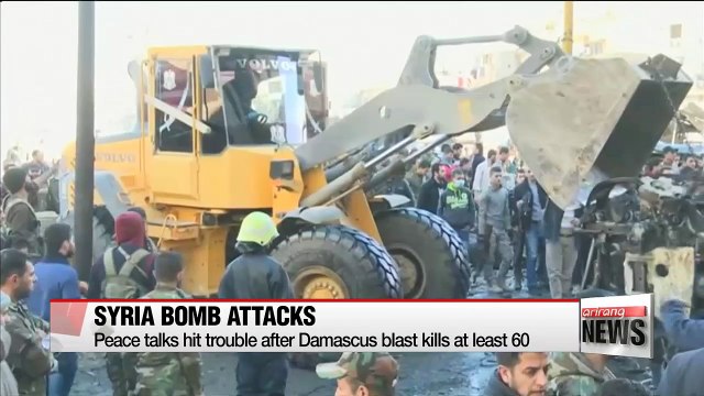 Syria peace talks hit trouble after Damascus blast kills at least 60