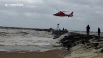 US Coast Guard helicopter rescues man over stormy seas