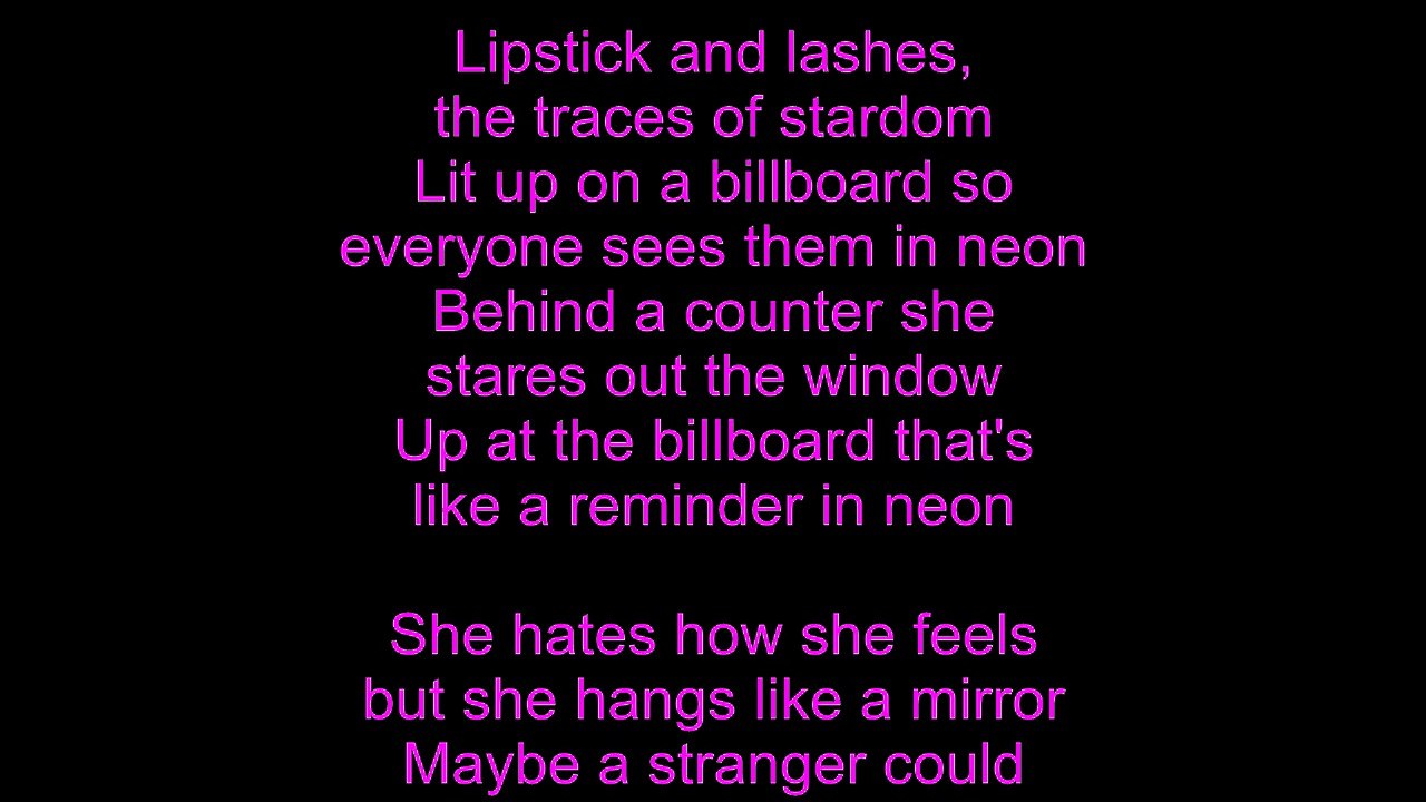 Elton John – In Neon Lyrics