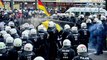 Germany will deport migrants who break law, warns Angela Merkel as thousands join anti-Islam protest