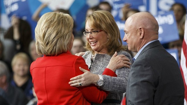 As Iowa caucuses loom, Clinton and Giffords team up on gun control