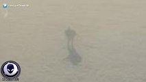 Passenger Snaps EERIE Pic Of Giant Robot Walking On Clouds Outside Plane 1/16/2016