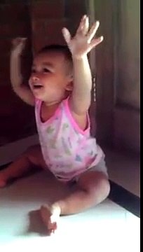 Funny Laughing Baby Playing Balloon