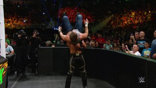 Seth Rollins powerbombs Dean Ambrose into the barricade_ Slow Mo Replay from Money in the Bank 2015 (1080p)