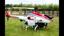 Yamaha RMax helicopter UC Davis helicopter drones for crop dusting