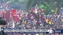 Watch Filipino Catholics climb onto statue of Jesus-copypasteads.com
