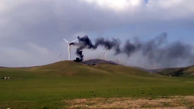 Wind turbine on fire explodes and falls down!