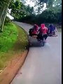 -Something strange motorcycle carrying more than four peopleشيء غريب دراجة نارية تقل أكثر من أربعة أشخاص
