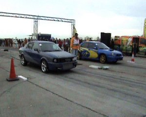 Download Video: Audi 90 Quattro Turbo Vs. Subaru Impreza WRX STI Drag Race