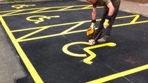 Painting Handicap Parking Signs