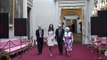 The Queen and The Duchess of Cambridge view the Royal Wedding Dress Exhibition