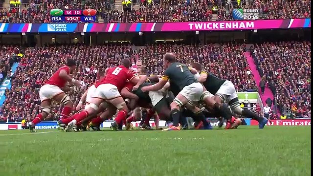 Dan Biggar hammers over a drop goal for Wales