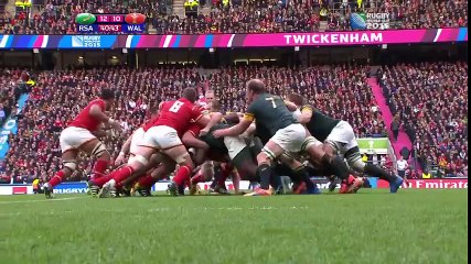 Dan Biggar hammers over a drop goal for Wales