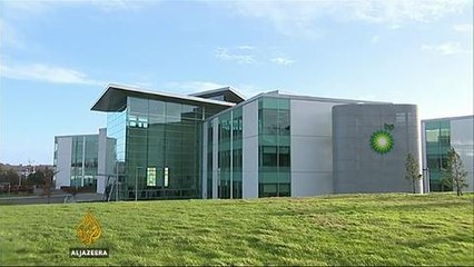 Global oil giants ExxonMobil and BP report losses