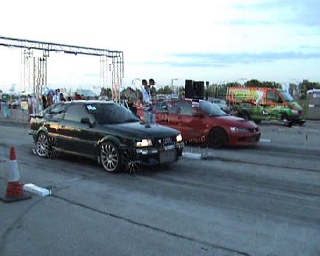 Audi S2 Coupe Vs. Mitsubishi Lancer EVO IX Drag Race