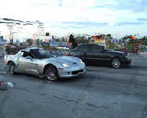 Chevrolet Corvette Z06 Vs. Mercedes E55 AMG Drag Race