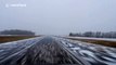 Snowy road conditions on Interstate-29 road in the US