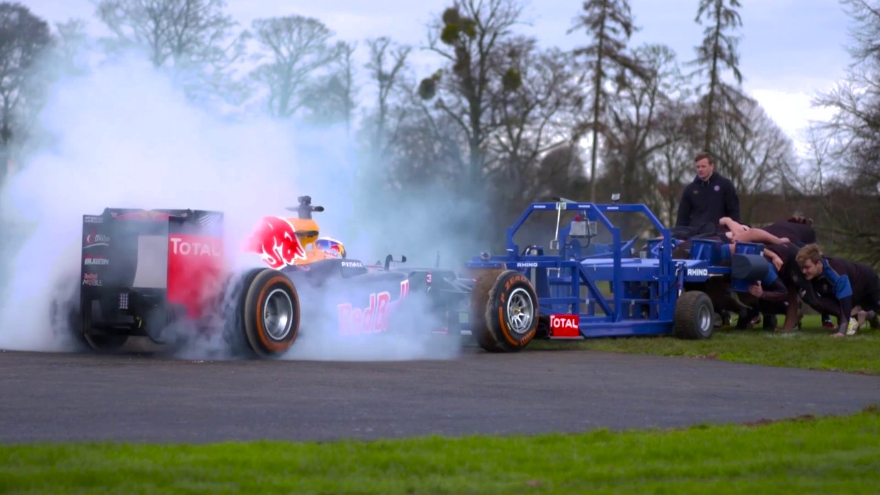 F1 Car vs. 8-Men Rugby Team