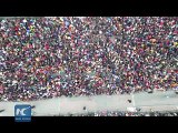 Drone footage thousands stranded in train station during holiday rush 2016