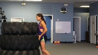 Girl Jumps on Top of Giant Tires