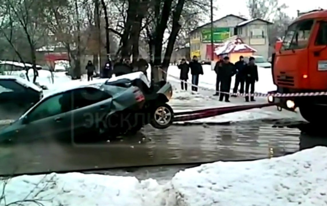 Pulling a Car Out of a Sink Hole Goes Wrong