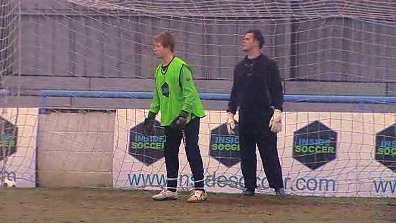 goalkeeper dealing with crossing