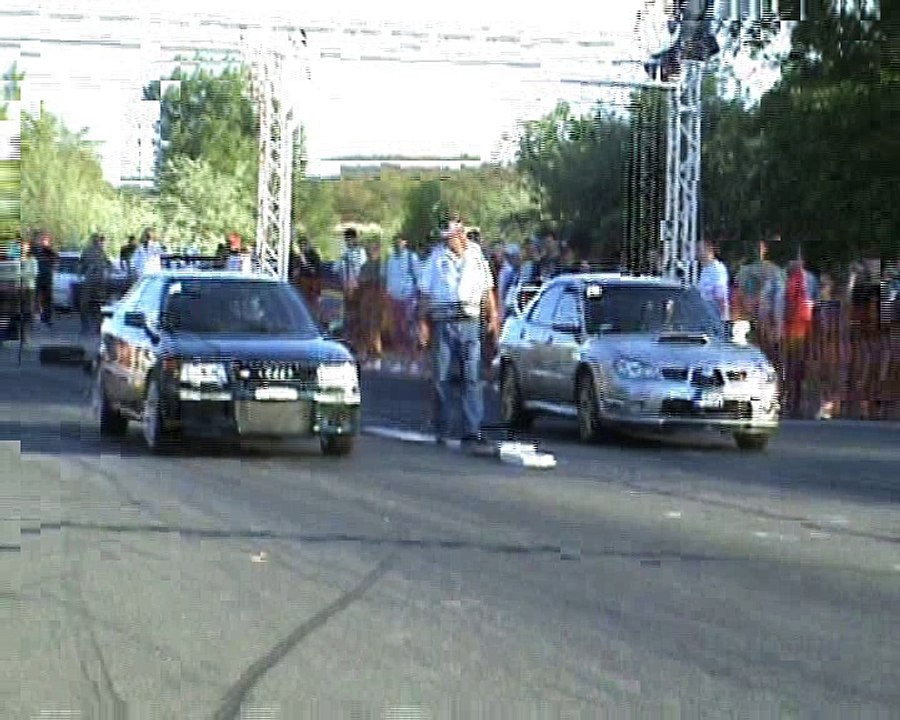 Audi S2 Coupe Vs. Subaru Impreza WRX STI Drag Race