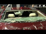 destroyed Cadillac is towed out of the arena- Raw Fallout