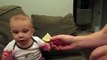 Child trying to eat the lemon .. such a cute baby
