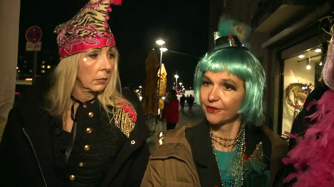 Carnival partygoer: 'The feeling is different but not afraid'