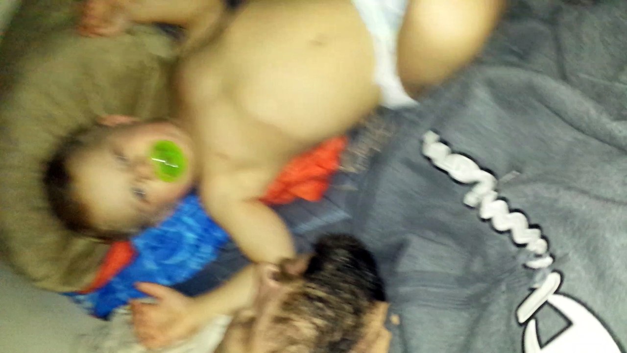 Funny Child Pretending to snore like daddy but is actually growling because he don't know how to snore yet!