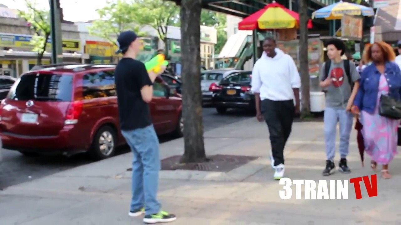 Water Gun Prank In The Hood - GONE WRONG - Spraying Water on People (3 Train TV)