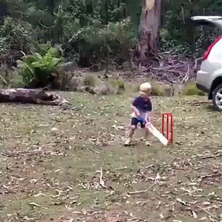 Funny Kid Playing Cricket