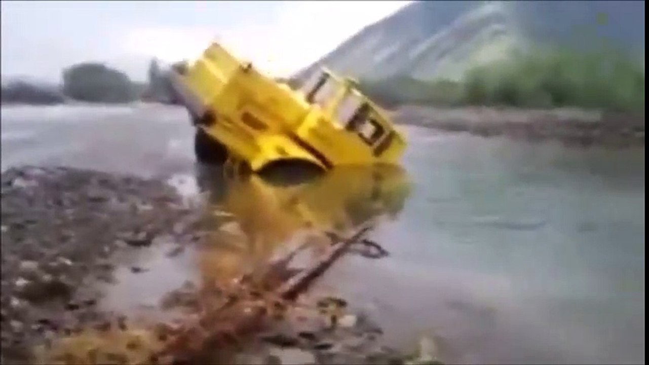Kirovets  driver stuck in water