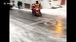 Motortricycle loses control on icy road