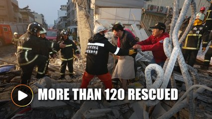 More than 120 rescued from toppled apartment in Taiwan