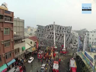 Taiwan residential tower toppled by 6.4 quake (AERIAL FOOTAGE)