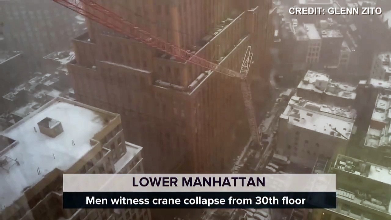 Watch as a crane collapses in Lower Manhattan, causing panic inside a nearby building. Ny
