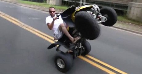 Idiot On 4-Wheeler Hits A Car Head On